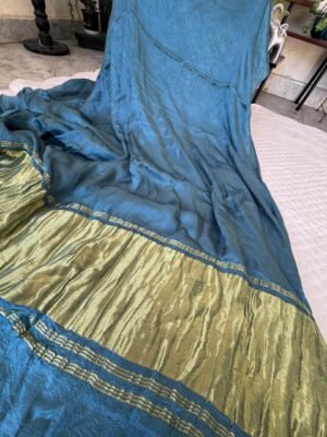 Plain modal silk saree with tissue pallu